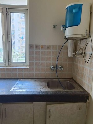 Kitchen in 2 BHK Apartment at Shree Vardhman Mantra, Sector 67 – for Rent