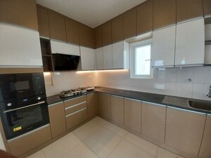 Kitchen in 3 BHK Apartment at Godrej Aqua, International Airport Road – for Rent