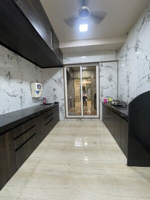 Kitchen in 4 BHK Apartment at Rashmi Signature, Mira Road – for Rent