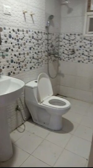 Bathroom in 3 BHK Apartment at Sunworld Arista, Sector 168 – for Rent