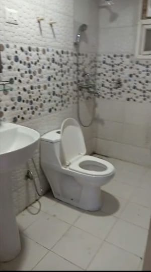 Bathroom in 3 BHK Apartment at Sunworld Arista, Sector 168 – for Rent