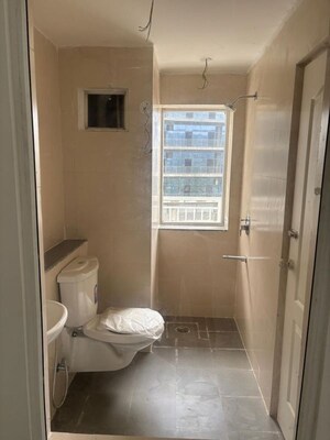 Bathroom in Studio Apartment at DAH Greentech NX One, Tech Zone 4 Greater Noida – for Rent