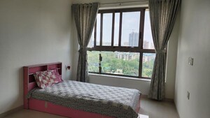 Bedroom in 2 BHK Apartment at Kalpataru Paramount, Kapur Bawdi – for Rent