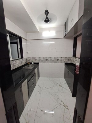 Kitchen in 2 BHK Apartment at Lokhandwala Harmony, Worli – for Rent