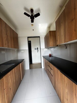 Kitchen in 3 BHK Apartment at Godrej Emerald, Ghodbunder Road – for Rent