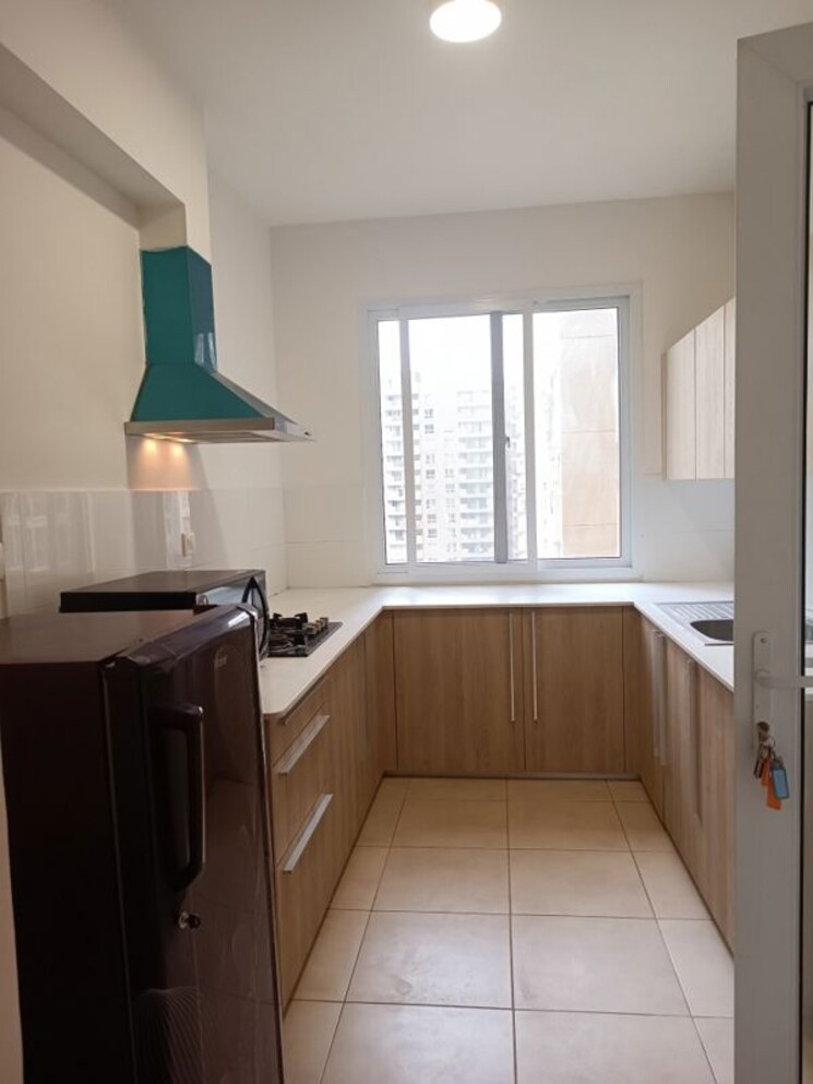 Kitchen, bhartiya-city-nikoo-homes-ii 2 Bedroom 1106 Sq.Ft. Apartment In Thanisandra Main Road Bangalore 9710031