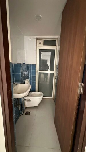 Bathroom in 1 BHK Apartment at Lodha Amara, Kolshet Road – for Rent