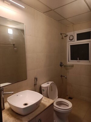 Bathroom in 2 BHK Apartment at Bhartiya Nikoo Homes, Thanisandra Main Road – for Rent