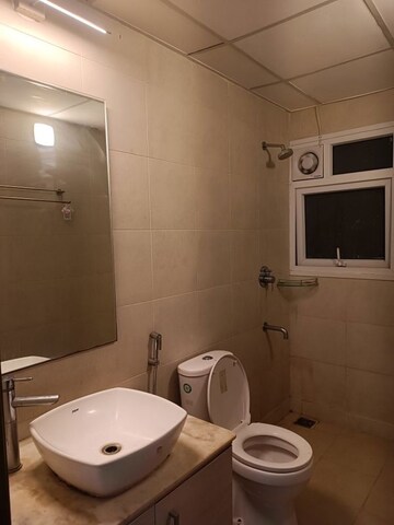 Bathroom in 2 BHK Apartment at Bhartiya Nikoo Homes, Thanisandra Main Road – for Rent