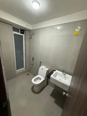 Bathroom in 2 BHK Apartment at Rustomjee Urbania Azziano, Thane West – for Rent