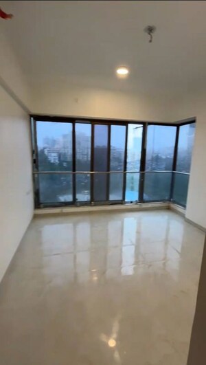 Room in 2 BHK Apartment at IM Applaud 38, Goregaon East – for Rent