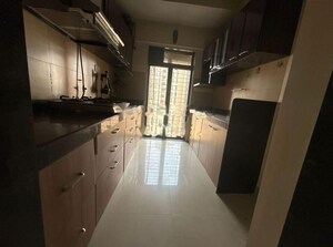 Kitchen in 2 BHK Apartment at Acme Ozone Oakwood and Ashwood, Manpada – for Rent