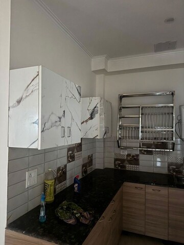 Kitchen in 2 BHK Apartment at Gaur Yamuna City 16th Park View, Gaur Yamuna City – for Rent