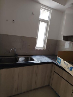 Kitchen in 3 BHK Apartment at Smart World Orchard, Sector 61 – for Rent