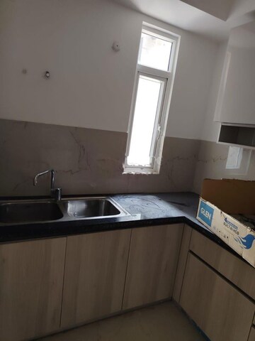 Kitchen in 3 BHK Apartment at Smart World Orchard, Sector 61 – for Rent