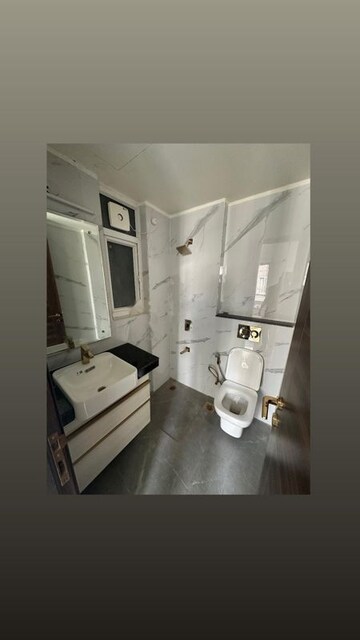 Bathroom in 3 BHK Apartment at Smart World Orchard, Sector 61 – for Rent