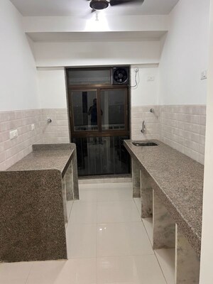 Kitchen in 1 BHK Apartment at Parinee Essence, Kandivali West – for Sale