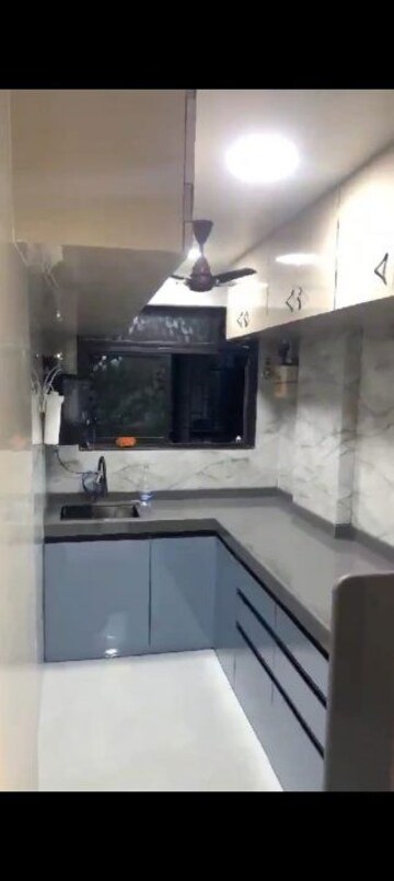 Kitchen in 1.5 BHK Apartment at Omkar Sanpada, Sanpada – for Sale