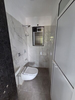 Bathroom in 2 BHK Apartment at Atharva Om Gautam Residency, Malad East – for Rent