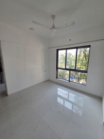 Room in 2 BHK Apartment at Atharva Om Gautam Residency, Malad East – for Rent