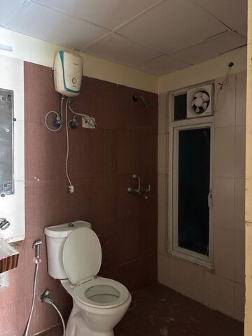 Bathroom in 3 BHK Apartment at Mahagun Moderne, Sector 78 – for Rent