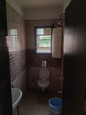 Bathroom in 2 BHK Apartment at Rohan Silver Gracia, Ravet – for Rent
