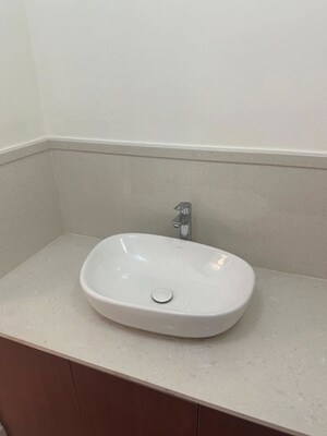 Bathroom in 4 BHK Apartment at Avenue Road – for Sale