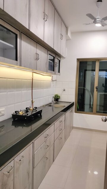 Kitchen in 3 BHK Apartment at Oberoi Realty Woods, Goregaon East – for Sale