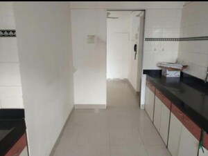 Kitchen in 1 BHK Apartment at Shubharambh Complex, Manpada – for Rent