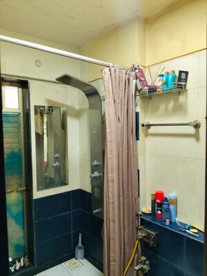 Bathroom in 3 BHK Apartment at Shivshakti Apartments, Andheri West – for Sale
