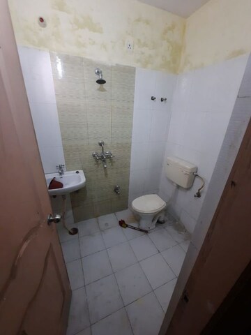 Bathroom in 2 BHK Apartment at Sigra – for Sale