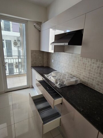 Kitchen in 3 BHK Apartment at Godrej Woods, Sector 43 – for Rent