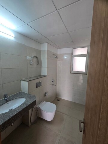 Bathroom in 3 BHK Apartment at Godrej Woods, Sector 43 – for Rent