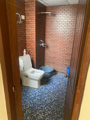 Bathroom in 2 BHK Apartment at Aims Greens Avenue, Sector 4 Greater Noida – for Rent