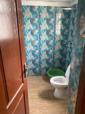 Bathroom in 2 BHK Apartment at Aims Greens Avenue, Sector 4 Greater Noida – for Rent