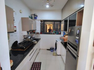 Kitchen in 2 BHK Apartment at Amanora Gold Towers, Hadapsar – for Sale