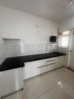 Kitchen in 1 BHK Apartment at Amanora Gold Towers, Hadapsar – for Sale