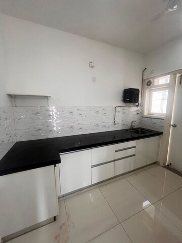 Kitchen in 1 BHK Apartment at Amanora Gold Towers, Hadapsar – for Sale