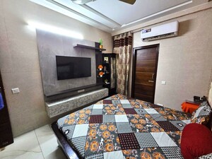 Bedroom in 3.5 BHK Builder Floor at Dhakoli – for Sale
