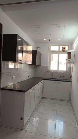 Kitchen in 3 BHK Builder Floor at Dhakoli – for Sale