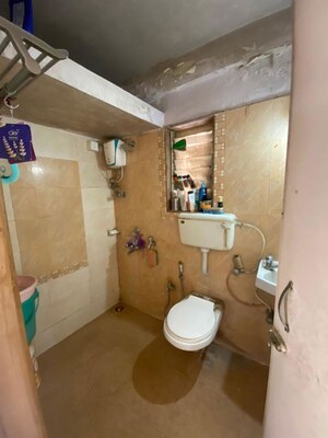 Bathroom in 1 BHK Apartment at Puranik Hometown, Ghodbunder Road – for Rent