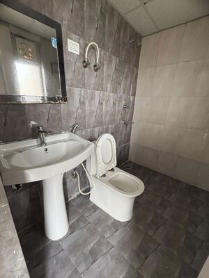 Bathroom in 3 BHK Apartment at Godrej Tropical Isle, Sector 146 – for Sale