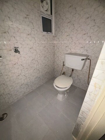 Bathroom in 2 BHK Apartment at Godrej Woods, Sector 43 – for Sale