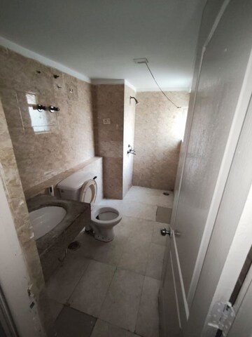 Bathroom in 1 BHK Apartment at Paras Seasons, Sector 168 – for Rent
