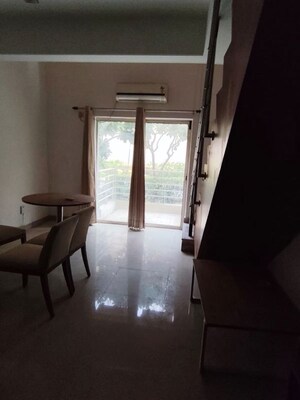 Living Room in 1 BHK Apartment at Paras Seasons, Sector 168 – for Rent