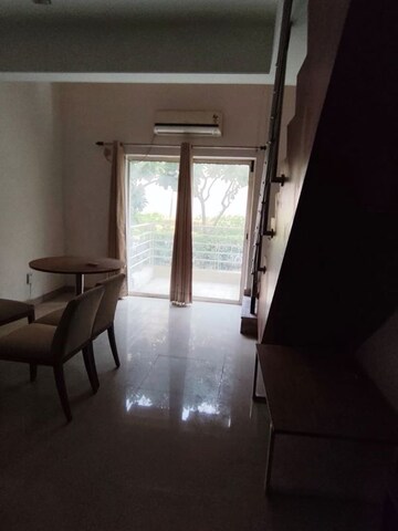 Living Room in 1 BHK Apartment at Paras Seasons, Sector 168 – for Rent