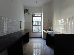 Kitchen in 3.5 BHK Apartment at Kalpataru Immensa C, Kolshet Road – for Sale