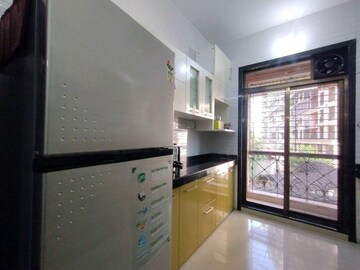 Kitchen in 2 BHK Apartment at Ravechi La Vista, Kharghar – for Rent