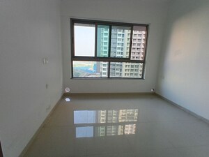 Room in 2 BHK Apartment at Kalpataru Immensa B, Kolshet Road – for Rent