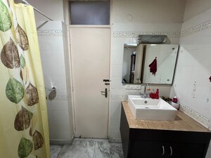 Bathroom in 4 BHK Apartment at Tarika CGHS, Sector 43 – for Sale